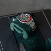 Single watch cushion from the black green single