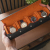 Showing the Personalized Watch Roll For 4 Watches in Black Orange